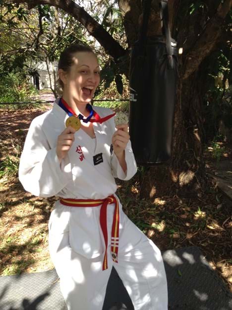 Nicole brings home a gold medal in red belt division poomsae and silver in high kick.